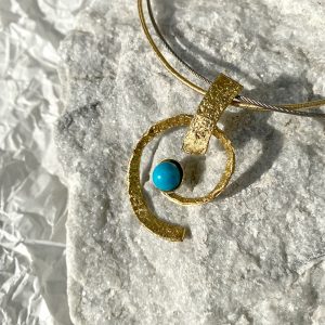 Gold and Silver necklace with blue stone
