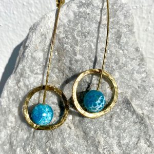 Gold earrings with blue stones