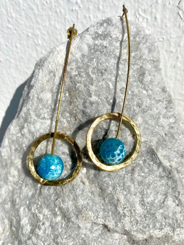 Gold earrings with blue stones