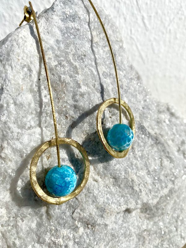 Gold earrings with blue stones