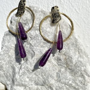 Gold earrings with purple stones