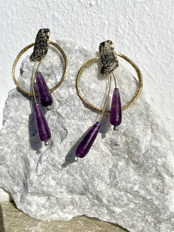 Gold earrings with purple stones