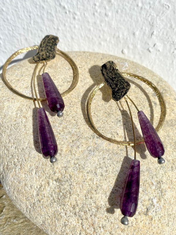 Gold earrings with purple stones