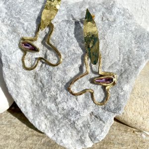 Gold earrings with purple stones