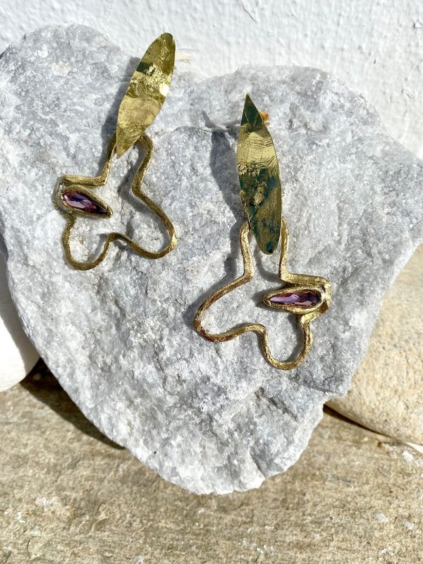 Gold earrings with purple stones