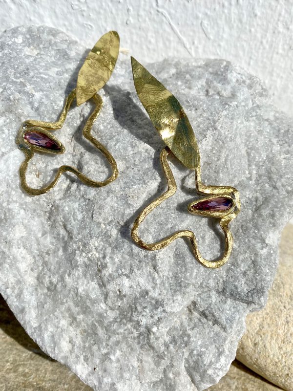 Gold earrings with purple stones